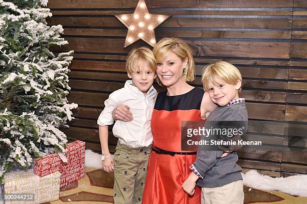 Actress Julie Bowen and sons attend the Baby2Baby Holiday Party Presented By Tiny Prints At Montage Beverly Hills on December 6, 2015 in Beverly...