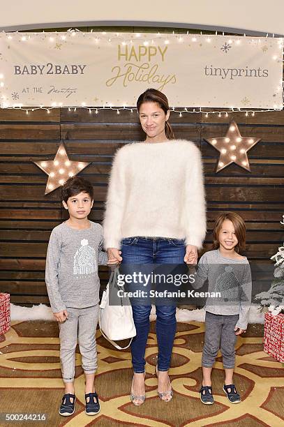 Elizabeth Guber Sugarman and sons attend the Baby2Baby Holiday Party Presented By Tiny Prints At Montage Beverly Hills on December 6, 2015 in Beverly...