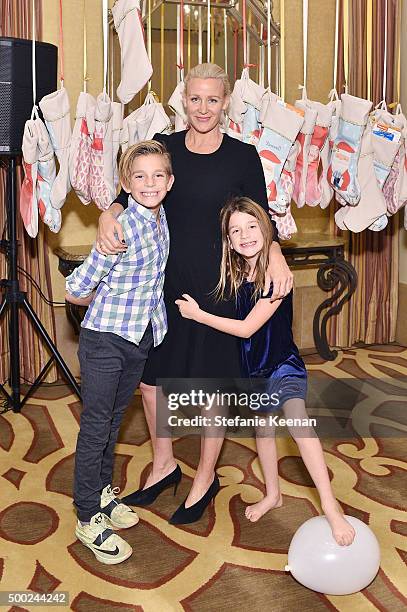 Ali Taekman and children attend the Baby2Baby Holiday Party Presented By Tiny Prints At Montage Beverly Hills on December 6, 2015 in Beverly Hills,...