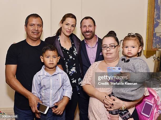 Actress Jennifer Garner and CEO of Shutterfly Inc Jeffrey Housenbold attend the Baby2Baby Holiday Party Presented By Tiny Prints At Montage Beverly...