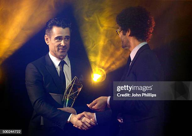 Host Richard Ayoade with Colin Farrell as he presents the Most Promising Newcomer Award at The Moet British Independent Film Awards 2015 on December...