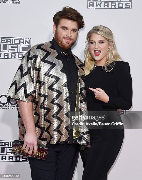 Recording artists Meghan Trainor and Who Is Fancy arrive at the 2015 American Music Awards at Microsoft Theater on November 22, 2015 in Los Angeles,...
