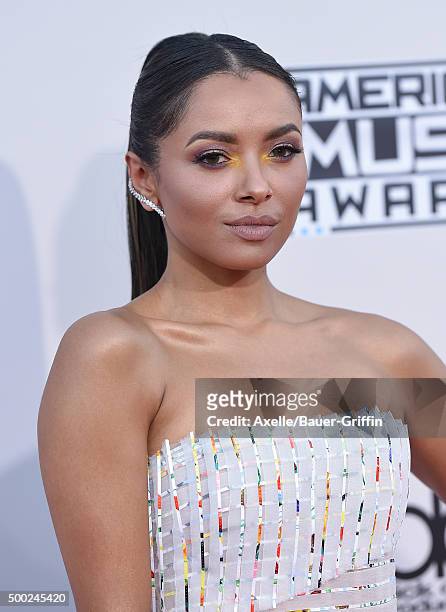 Singer/actress Kat Graham arrives at the 2015 American Music Awards at Microsoft Theater on November 22, 2015 in Los Angeles, California.