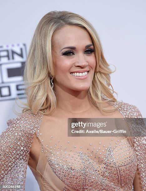 Singer Carrie Underwood arrives at the 2015 American Music Awards at Microsoft Theater on November 22, 2015 in Los Angeles, California.
