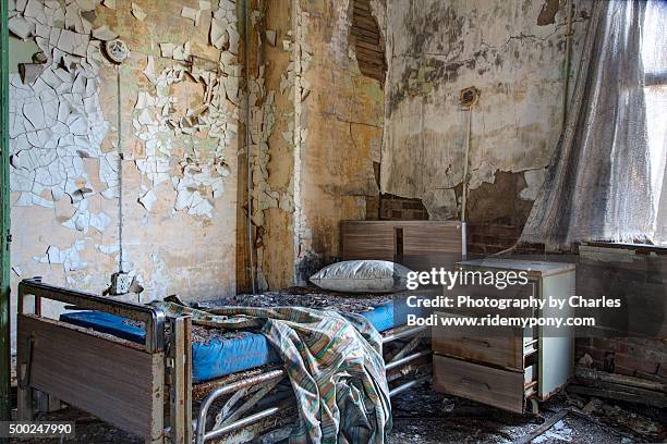 asylum bed - rotten com stock pictures, royalty-free photos & images