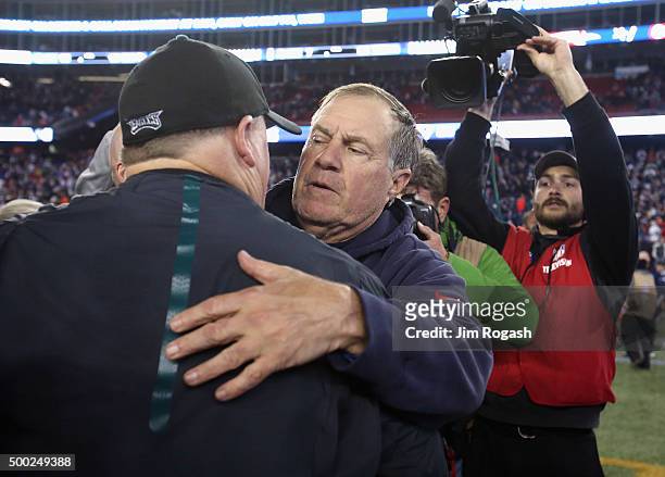 Head coach Bill Belichick of the New England Patriots greets head coach Chip Kelly of the Philadelphia Eagles after their game at Gillette Stadium on...