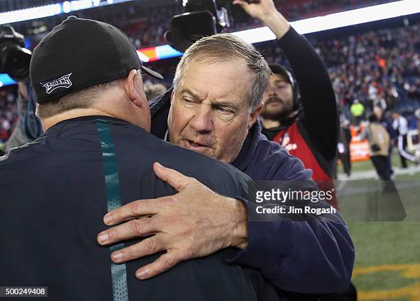 Head coach Bill Belichick of the New England Patriots greets head coach Chip Kelly of the Philadelphia Eagles after their game at Gillette Stadium on...