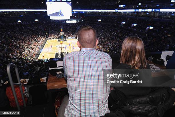 American Express Card Members enjoy the Nets vs. Warriors game at Barclays Center in the Centurion Suite Sunday night on December 6, 2015 in New York...