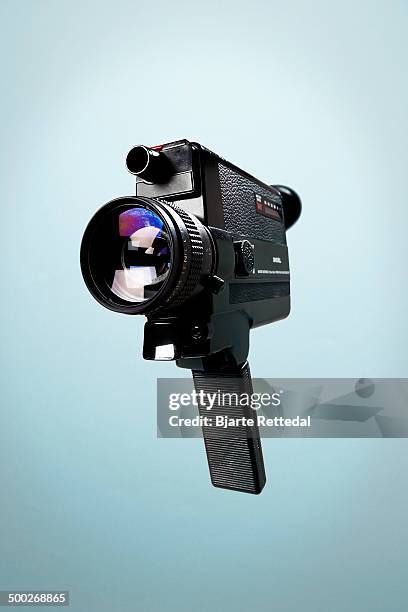 8mm film camera - movie camera stock pictures, royalty-free photos & images