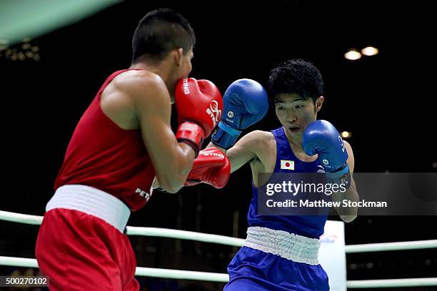 Juliao De Miranda Henriques Neto of Brazil fights Ryomei Tanaka of Japan during the Men's Fly class during the International Boxing Tournament -...