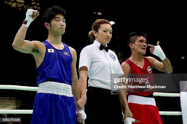 Ryomei Tanaka of Japan celebrates his TKO over Juliao De Miranda Henriques Neto of Brazil the Men's Fly class during the International Boxing...