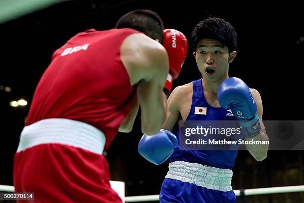 Juliao De Miranda Henriques Neto of Brazil fights Ryomei Tanaka of Japan during the Men's Fly class during the International Boxing Tournament -...