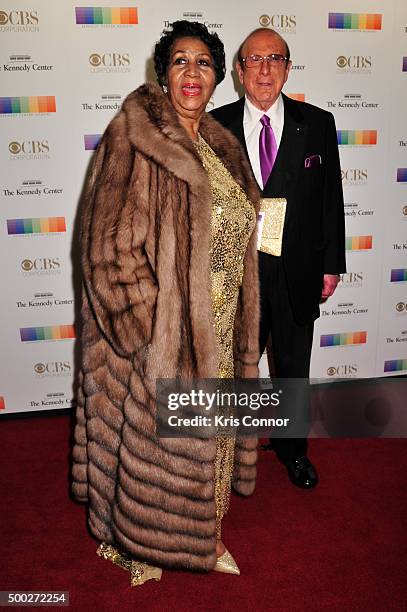 Singer Aretha Franklin and Clive Davis arrive at the 38th Annual Kennedy Center Honors Gala at the Kennedy Center for the Performing Arts on December...