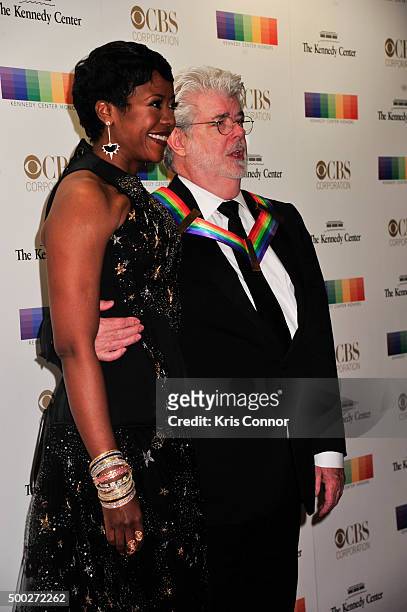 Honoree George Lucas and Mellody Hobson arrive at the 38th Annual Kennedy Center Honors Gala at the Kennedy Center for the Performing Arts on...