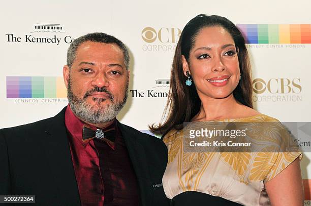 Laurence Fishburne and Gina Torres arrive at the 38th Annual Kennedy Center Honors Gala at the Kennedy Center for the Performing Arts on December 6,...