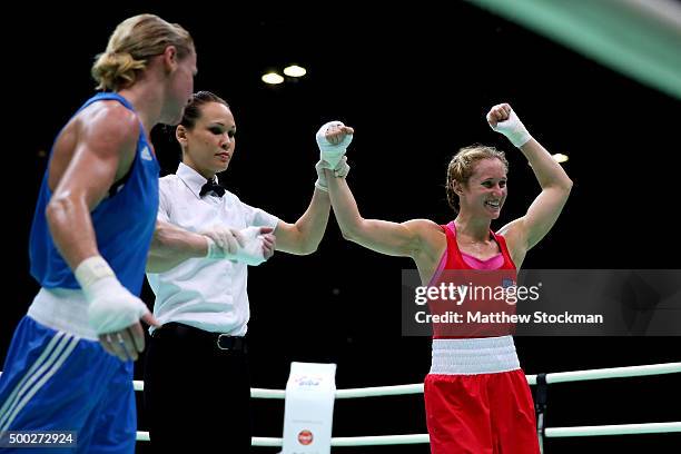 Virginia Fuchs of the United States celebrates her win over Lisa Jane Whiteside of Great Britain during the Women's Fly class during the...