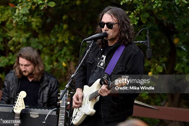 Robbie Bennett and Adam Granduciel of The War On Drugs perform onstage during the MusiCares house concert with Ben Gibbard, St. Vincent and The War...