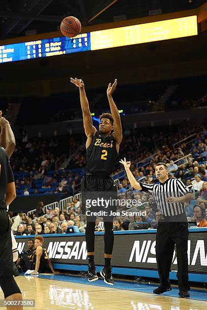 Nick Faust of the Long Beach State 49ers takes a shot from the three point line in the second period against the UCLA Bruins at Pauley Pavilion on...