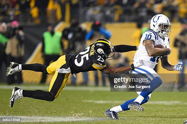 Brandon Boykin of the Pittsburgh Steelers grabs onto Donte Moncrief of the Indianapolis Colts as he carries the ball in the fourth quarter during the...