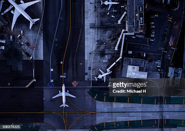 airliners at gates and control tower at lax - airport above stock-fotos und bilder