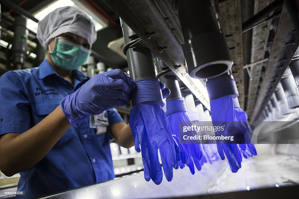 Production And Operations At Top Glove Corp. Headquarters And Portraits Of Chairman Lim Wee Chai