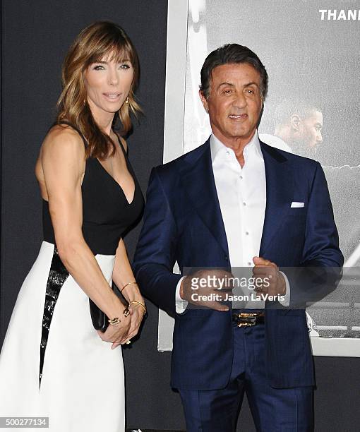 Jennifer Flavin and Sylvester Stallone attend the premiere of "Creed" at Regency Village Theatre on November 19, 2015 in Westwood, California.