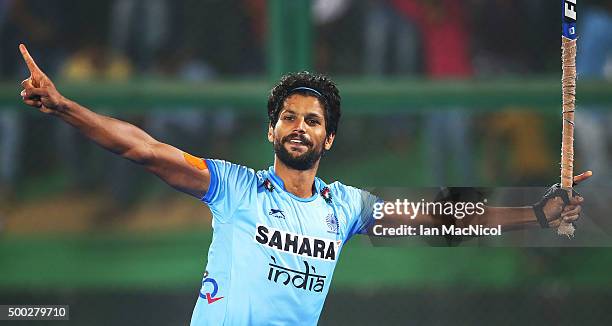 Rupinder Pal Singh of India celebrates scoring the winning penalty during the penalty shoot out during the match between Netherlands and India on day...