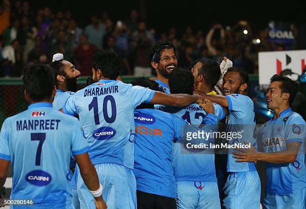 Rupinder Pal Singh of India is congratulated by team mates during the match between Netherlands and India on day ten of The Hero Hockey League World...