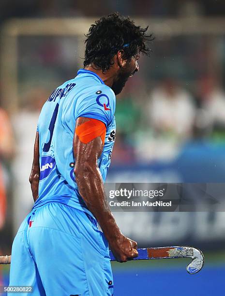 Rupinder Pal Singh of India celebrates scoring during the match between Netherlands and India on day ten of The Hero Hockey League World Final at the...