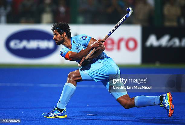 Rupinder Pal Singh of India strikes the ball during the match between Netherlands and India on day ten of The Hero Hockey League World Final at the...