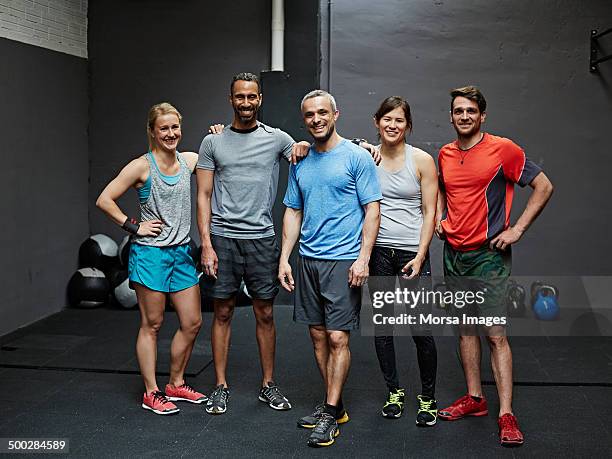 portrait of smiling gymters - スポーツウェア ストックフォトと画像