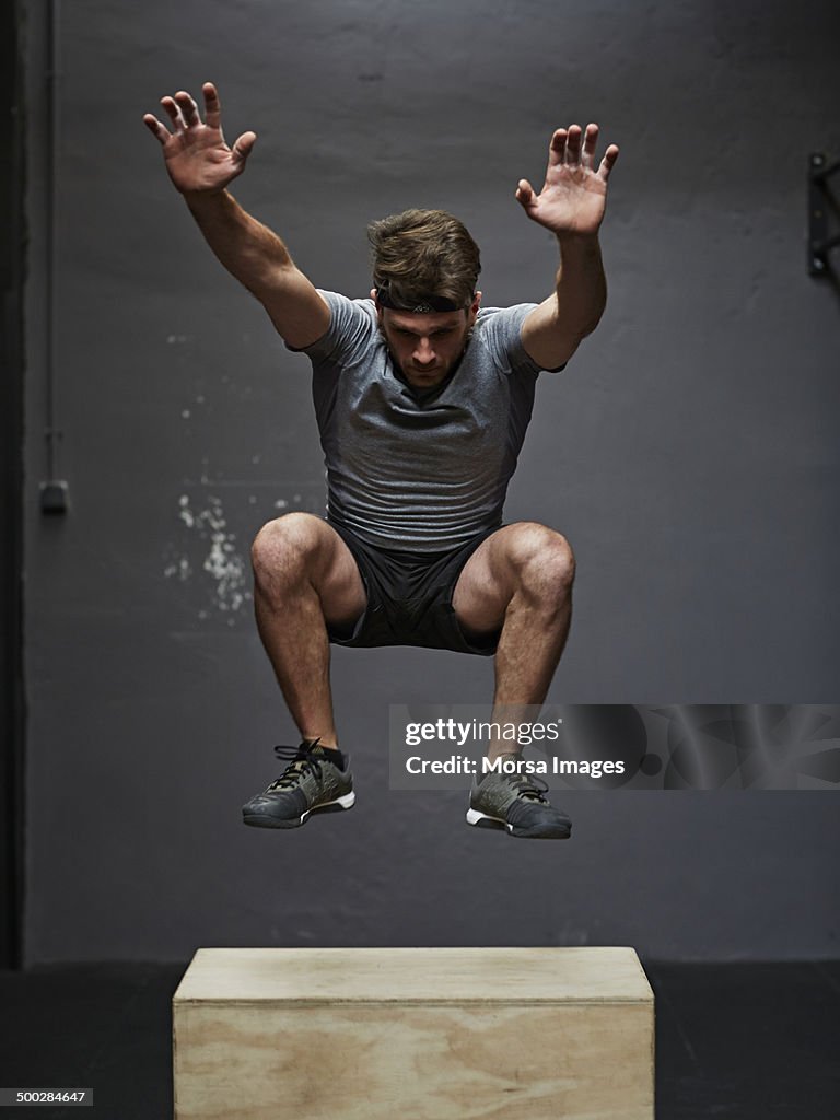 Gym jumping on box