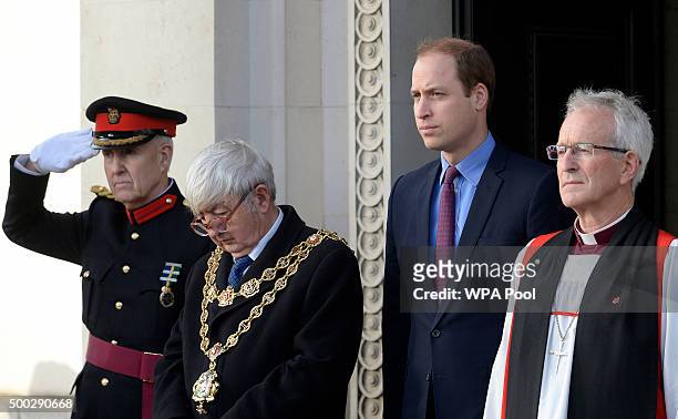 Prince William, Duke of Cambridge observes a two minute silence alongside the Lord Mayor of Birmingham Councillor Raymond Hassall and The Bishop of...