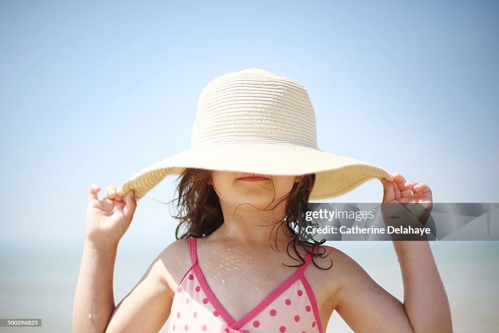 A 5 years old girl on the beach