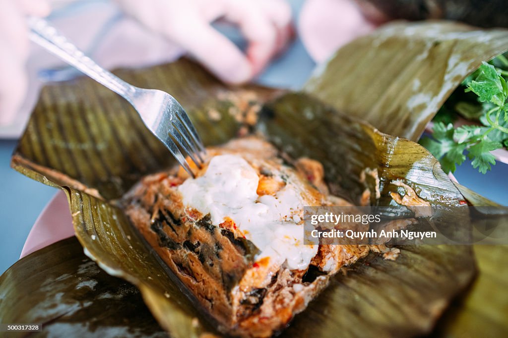 Steamed thai fish curry custard mousse (Hor Mok) wrapped in banana leaves