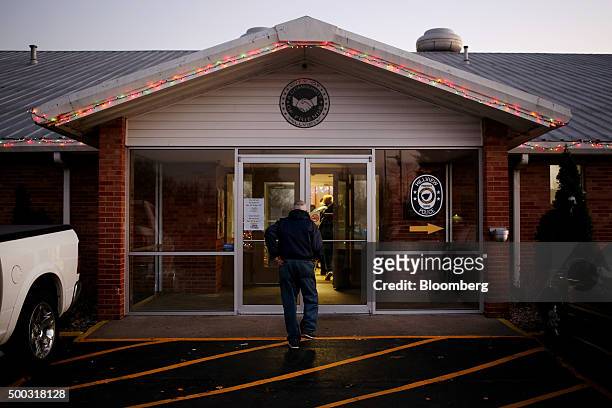 Residents arrive for a weekly bluegrass jamboree and fish fry at the Hillview City Offices in Hillview, Kentucky, U.S., on Thursday, Nov. 3, 2015. In...