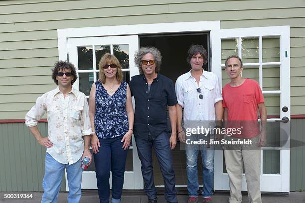 The jayhawks Marc Perlman, Karen Grotberg, Gary Louris, Kraig Johnson, and Tim O'Reagan pose for a portrait in Loring Park in Minneapolis, Minnesota...