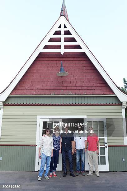 The jayhawks Marc Perlman, Karen Grotberg, Gary Louris, Kraig Johnson, and Tim O'Reagan pose for a portrait in Loring Park in Minneapolis, Minnesota...