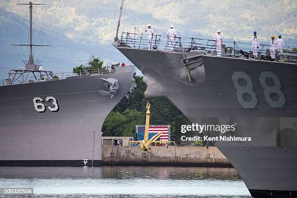 The U.S.S. Preble performs a pass-in-review as it passes the U.S.S. Missouri during a memorial service marking the 74th Anniversary of the attack on...