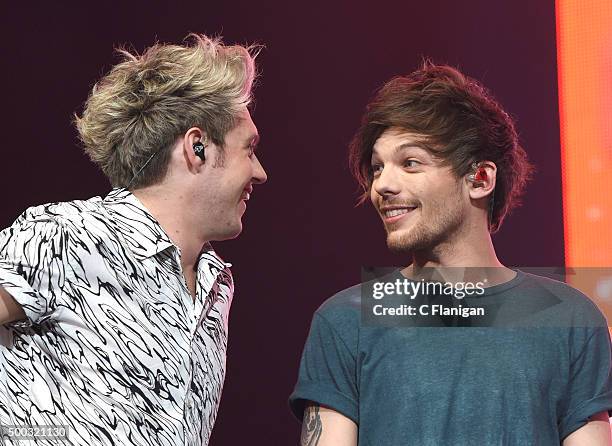 Singers Niall Horan and Louis Tomlinson of One Direction perform during the 6th Annual 99.7 NOW! Triple Ho Show at SAP Center on December 2, 2015 in...