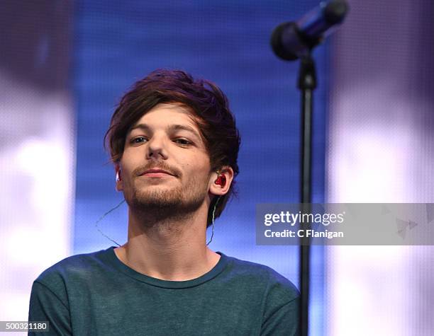 Singer Louis Tomlinson of One Direction performs during the 6th Annual 99.7 NOW! Triple Ho Show at SAP Center on December 2, 2015 in San Jose,...