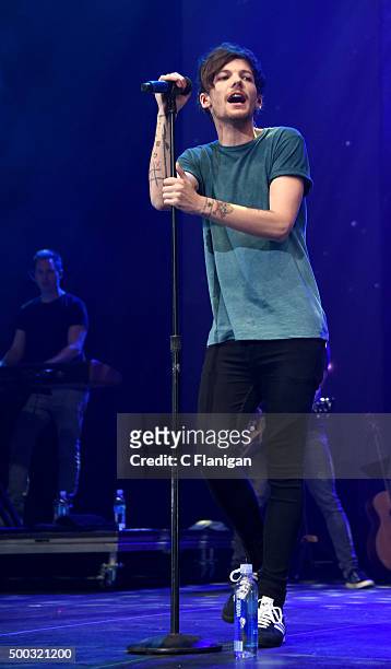 Singer Louis Tomlinson of One Direction performs during the 6th Annual 99.7 NOW! Triple Ho Show at SAP Center on December 2, 2015 in San Jose,...