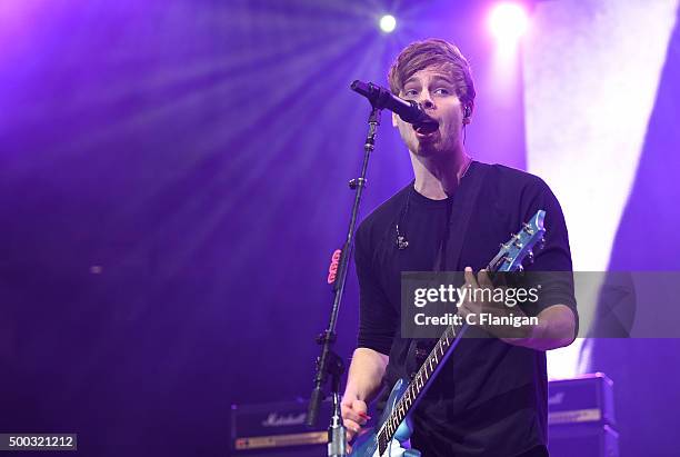 Musician Luke Hemmings of 5 Seconds of Summer performs during the 6th Annual 99.7 NOW! Triple Ho Show at SAP Center on December 2, 2015 in San Jose,...