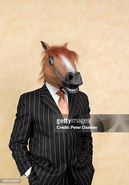 the banker is an ass - horse head fotografías e imágenes de stock