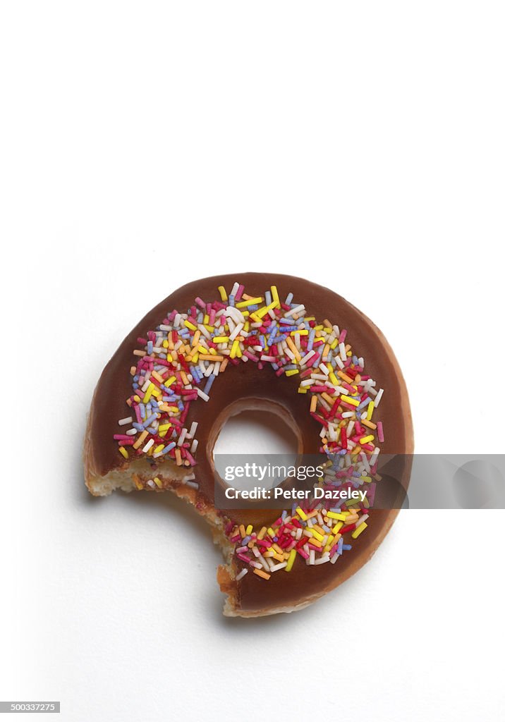 Bite out of donut with copy space