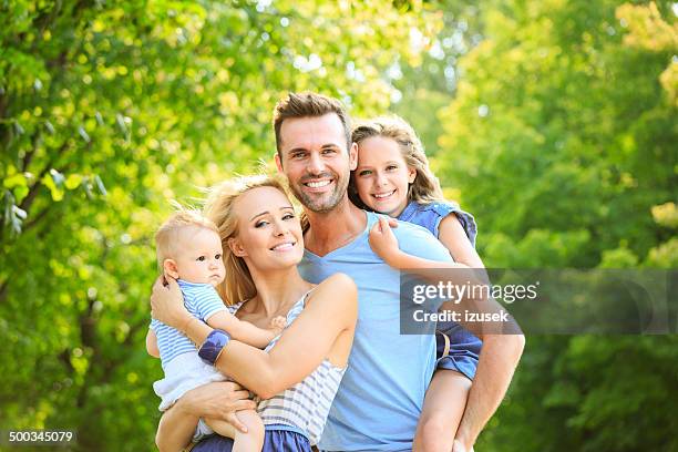 happy family - father standing stockfoto's en -beelden