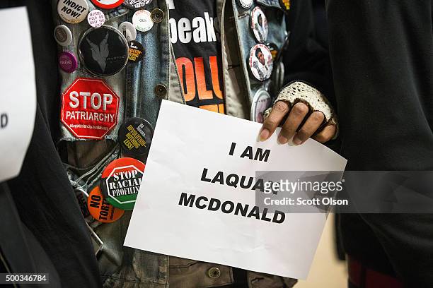 Demonstrators protest the shooting death of Laquan McDonald by a Chicago police officer outside the mayor's office in City Hall on December7, 2015 in...