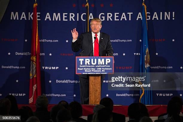 Republican presidential candidate Donald Trump speaks to the crowd at a Pearl Harbor Day Rally at the U.S.S. Yorktown December 7, 2015 in Mt....