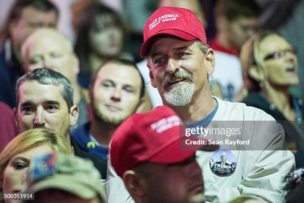 Supporters listen as Republican presidential candidate Donald Trump speaks to the crowd Pearl Harbor Day Rally At USS Yorktown Monday, December 7 in...