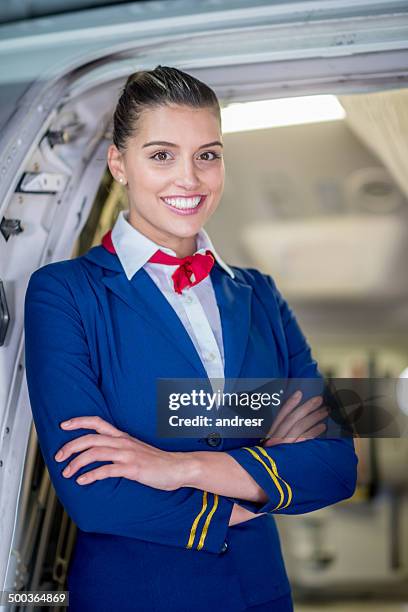 happy eine hostess - stewardess stock-fotos und bilder